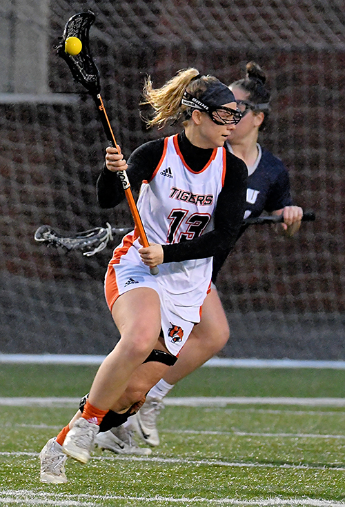 Tigers erase early deficit, beat AMU